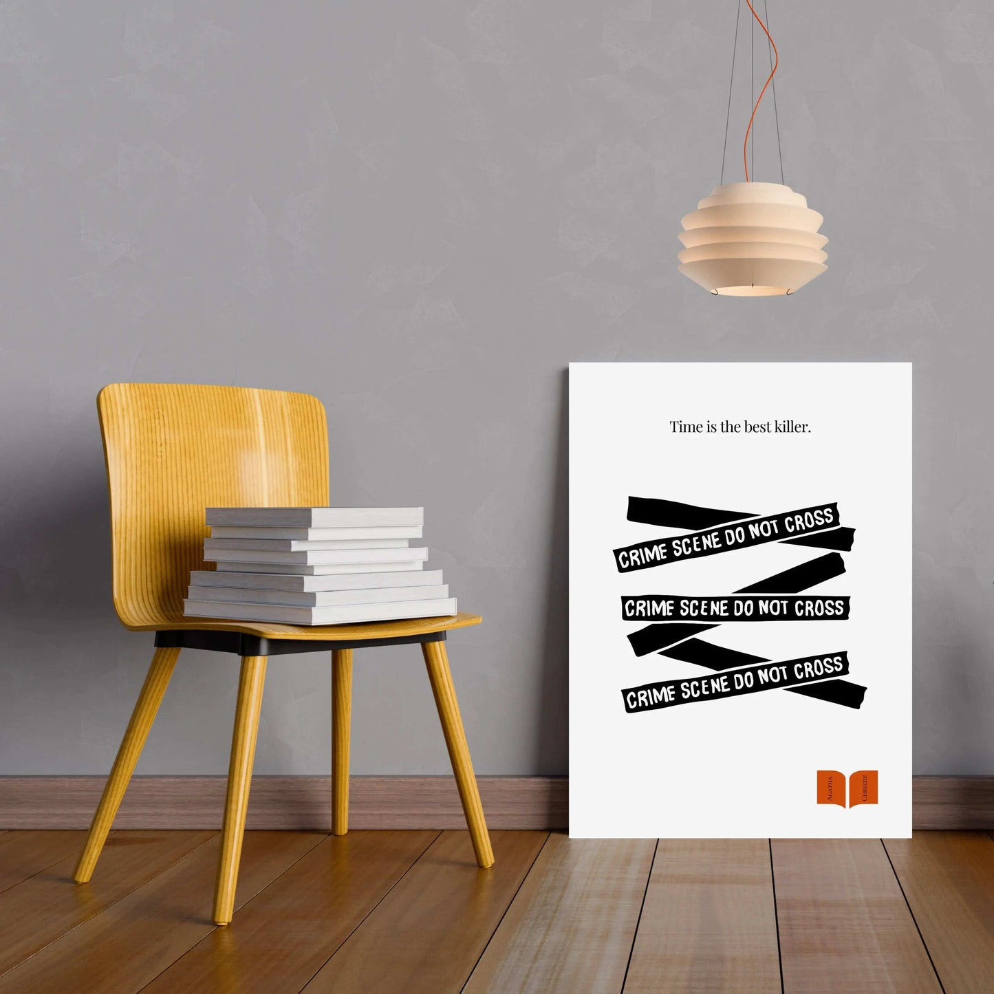 Yellow chair with books against a gray wall with a poster A minimalist black and white poster featuring text elements related to a crime scene and the quote 'Time is the best killer' from Agatha Christie. displaying text.