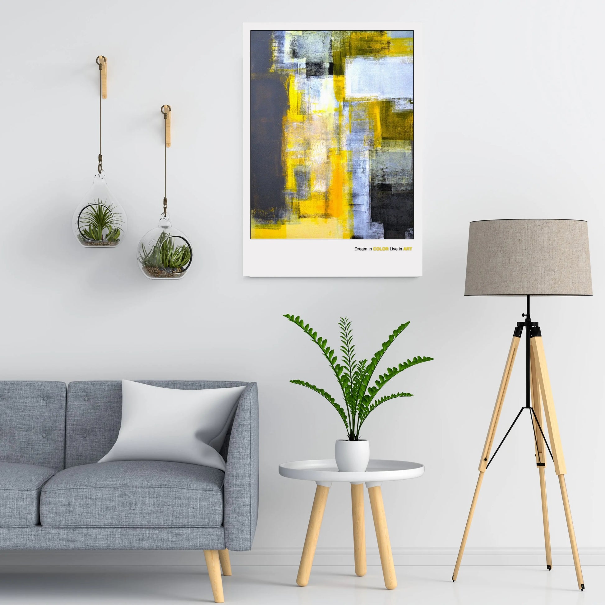 An abstract fine art poster featuring geometric shapes in yellow, gray, and black colors with the phrase 'Dream in COLOR Live in ART' at the bottom.