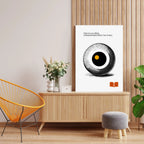 Minimalist poster featuring a stylized halftone eye in black and white with a central golden dot, paired with a Thomas Wolfe quote about perception and seeing deeply.